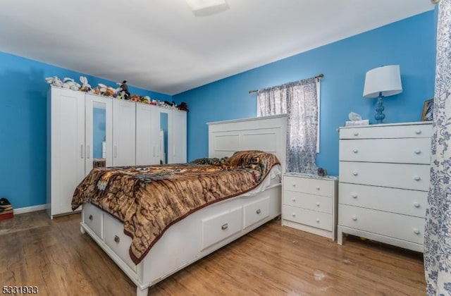 bedroom featuring light hardwood / wood-style flooring