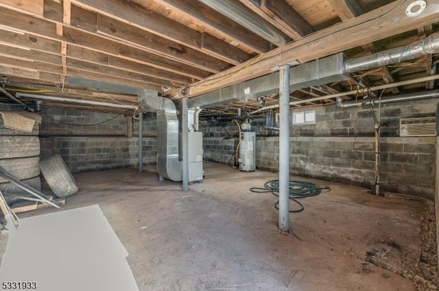 basement with gas water heater and heating unit