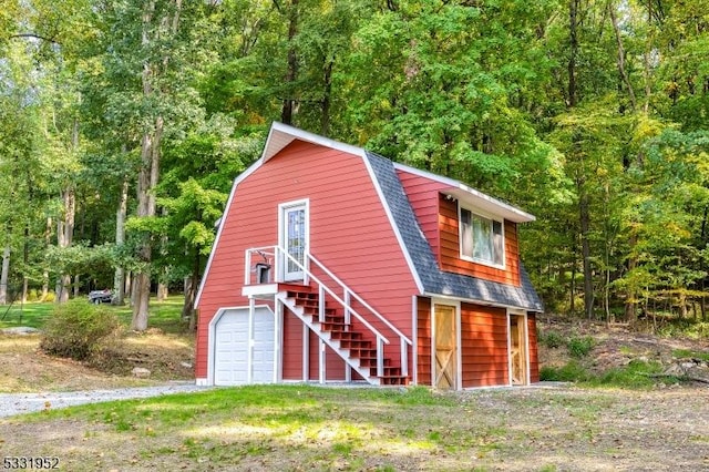 view of outbuilding featuring a garage