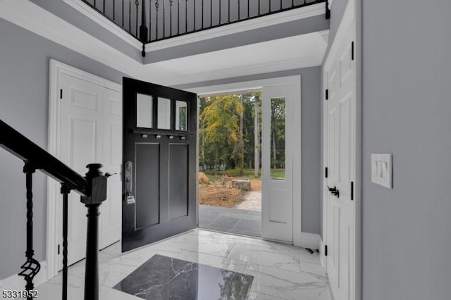 entryway with a high ceiling