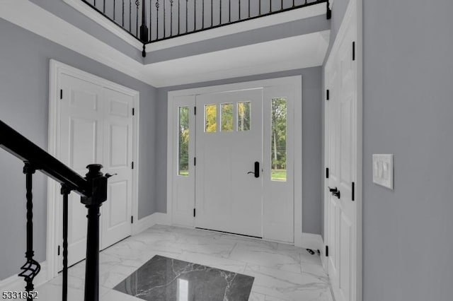 foyer featuring a high ceiling