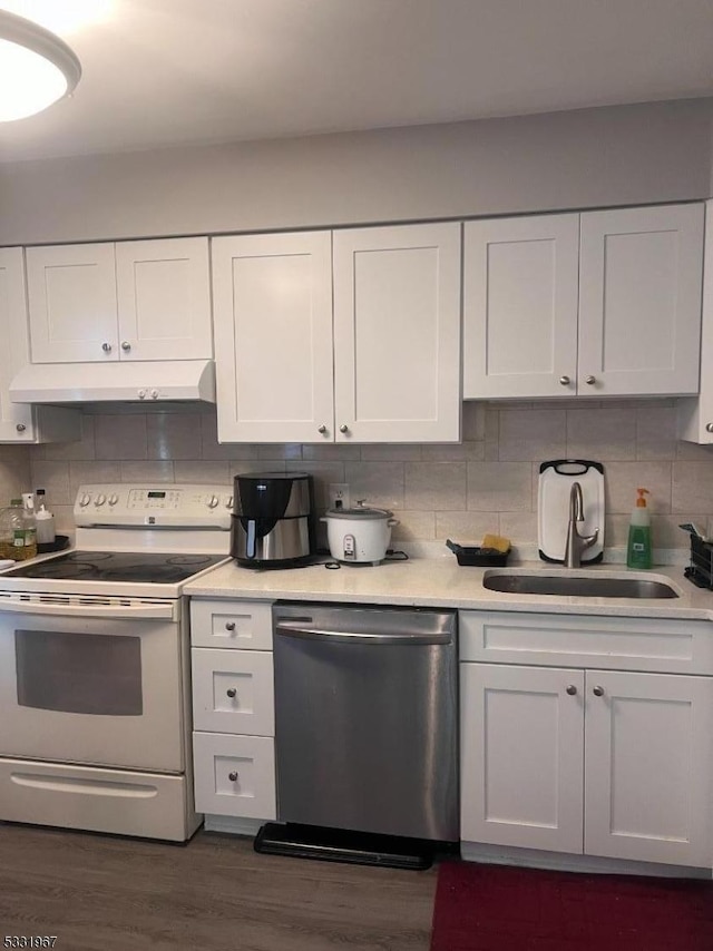 kitchen featuring tasteful backsplash, white range with electric cooktop, white cabinets, and stainless steel dishwasher