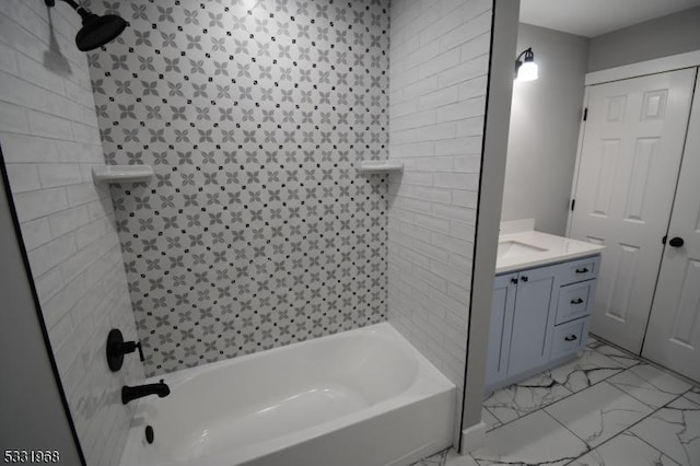 bathroom featuring vanity and  shower combination