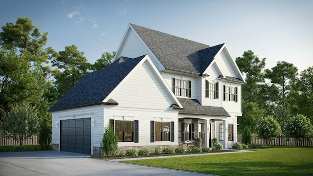 view of front facade featuring a garage and a front lawn