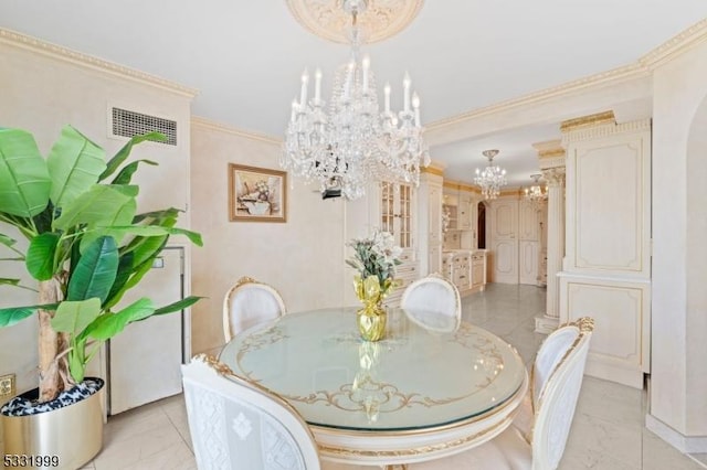 tiled dining space with a chandelier and ornamental molding