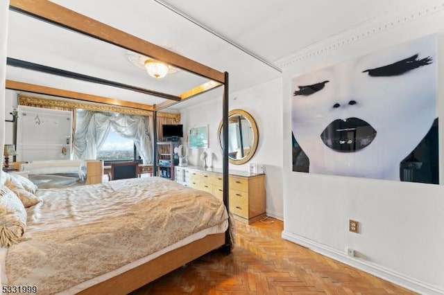 bedroom with light parquet flooring