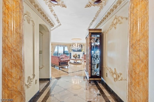 hallway featuring ornamental molding