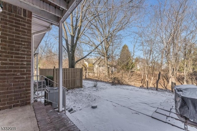 view of yard covered in snow