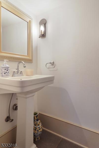 bathroom featuring tile patterned floors and sink