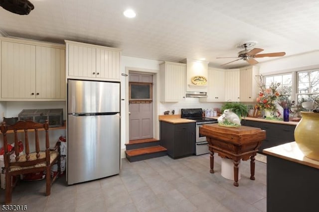 kitchen with ceiling fan and stainless steel appliances