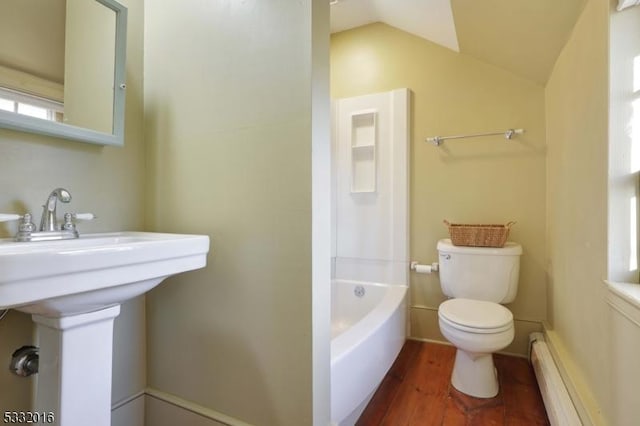 full bathroom featuring sink, wood-type flooring, a baseboard radiator, toilet, and lofted ceiling