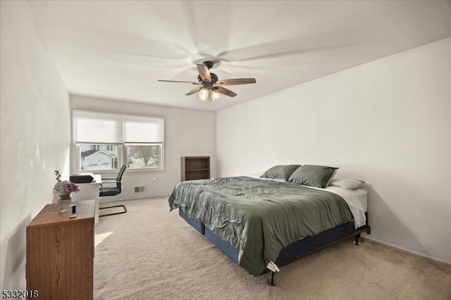 bedroom featuring carpet and ceiling fan