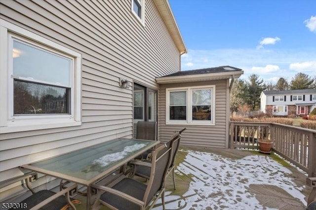 view of snow covered deck