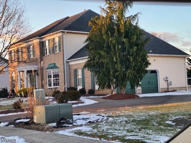 view of front of property with a garage