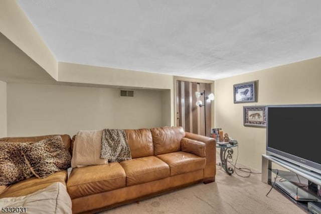 living room featuring light carpet