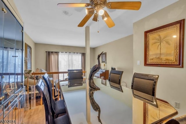 dining area with ceiling fan