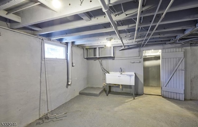 basement featuring sink