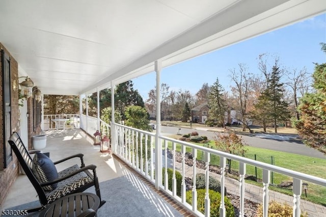 balcony featuring a porch