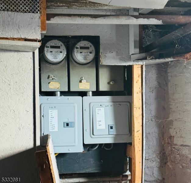 utility room featuring electric panel