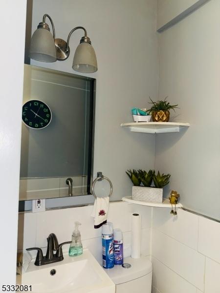 bathroom with toilet and sink