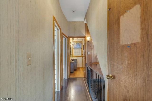 hall with hardwood / wood-style flooring