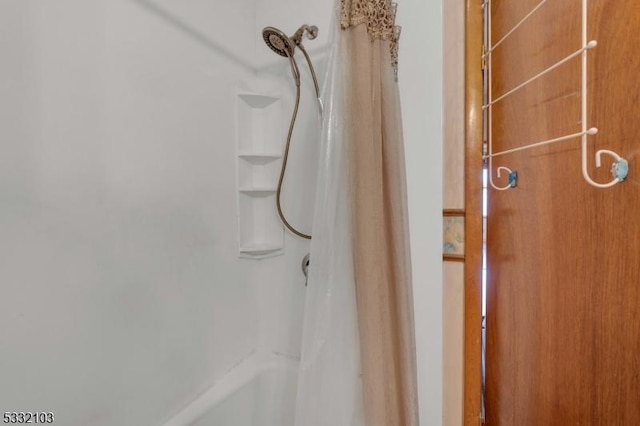 bathroom with curtained shower