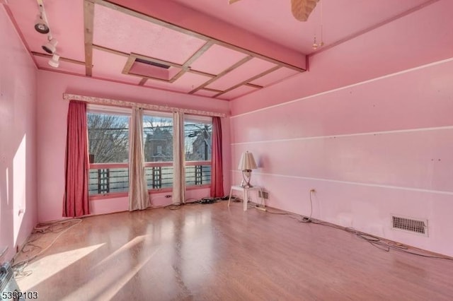 misc room featuring hardwood / wood-style floors and ceiling fan