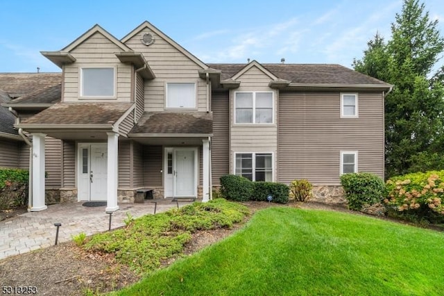 view of front of property with a front lawn