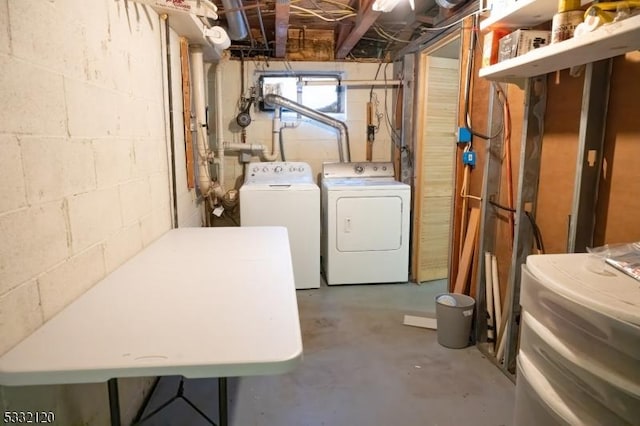 basement with washing machine and dryer