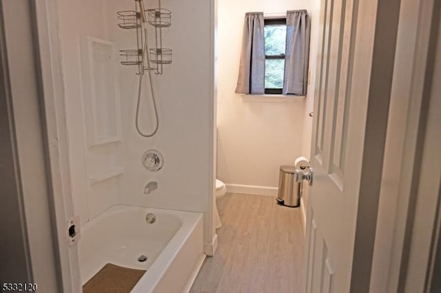 bathroom featuring toilet and hardwood / wood-style flooring