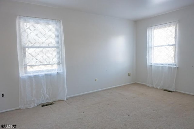 view of carpeted spare room