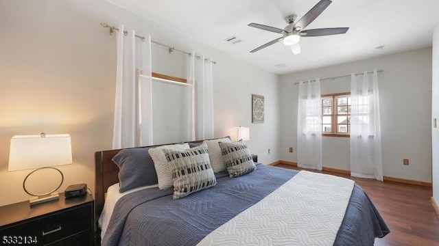 bedroom featuring ceiling fan and hardwood / wood-style floors