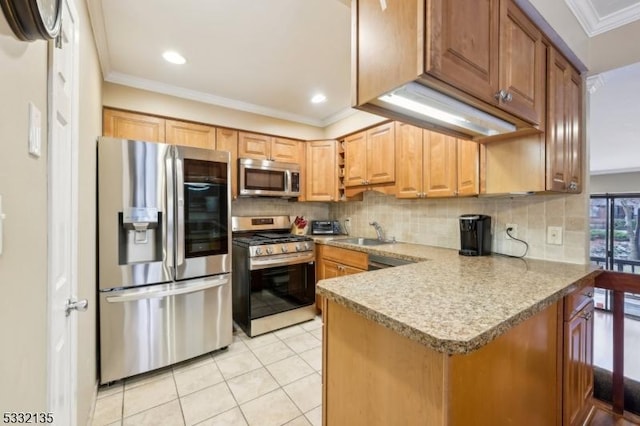 kitchen featuring decorative backsplash, sink, stainless steel appliances, and ornamental molding