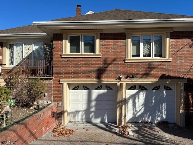 exterior space with a garage