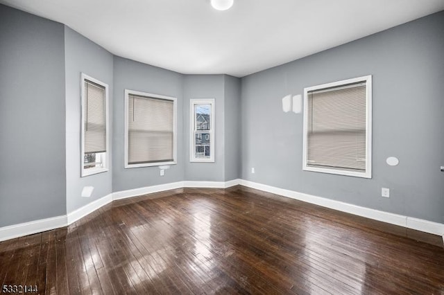 empty room featuring hardwood / wood-style floors