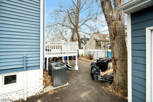 view of patio featuring a deck and central AC unit