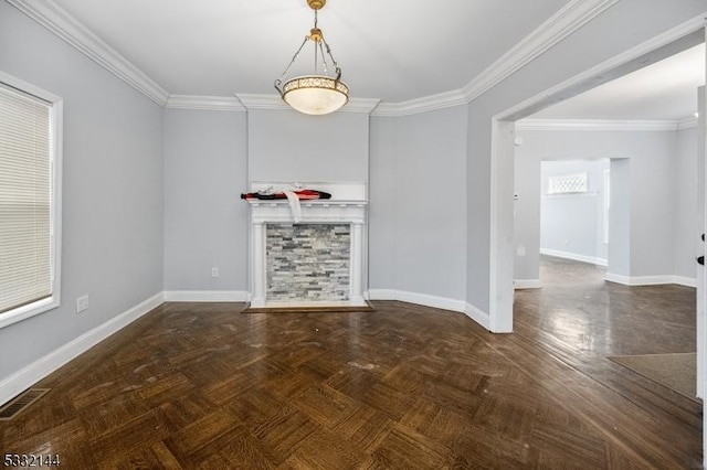 interior space with dark parquet floors, a fireplace, and crown molding