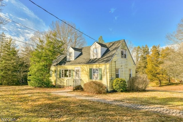 view of home's exterior featuring a yard