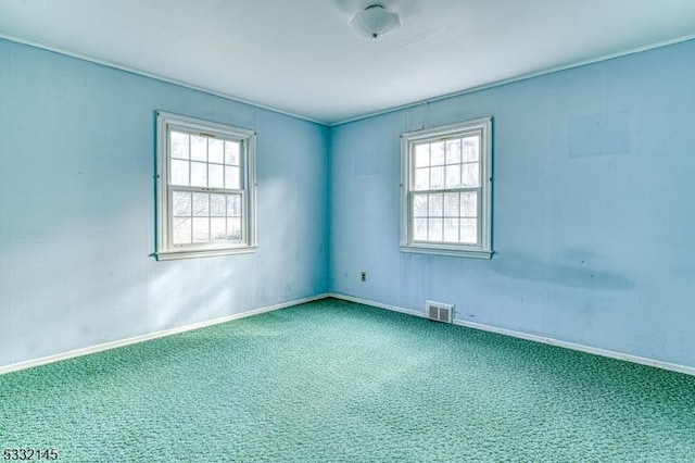 view of carpeted spare room