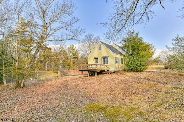 rear view of house with a deck