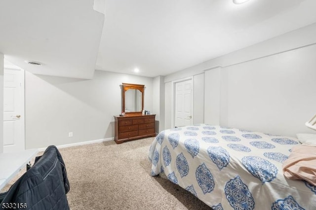 bedroom featuring carpet floors and a closet