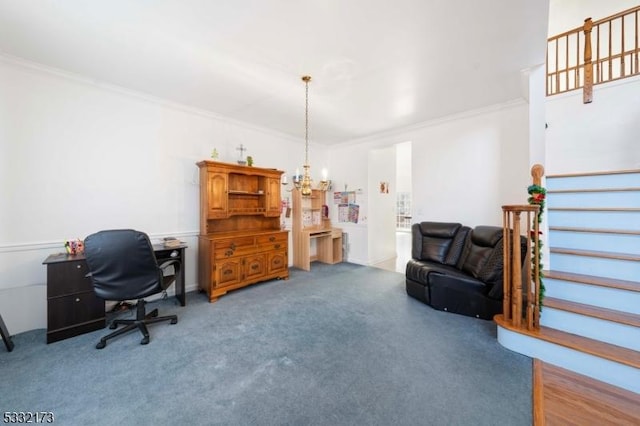 carpeted home office featuring crown molding and a notable chandelier