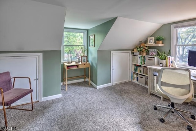 office featuring light colored carpet and lofted ceiling