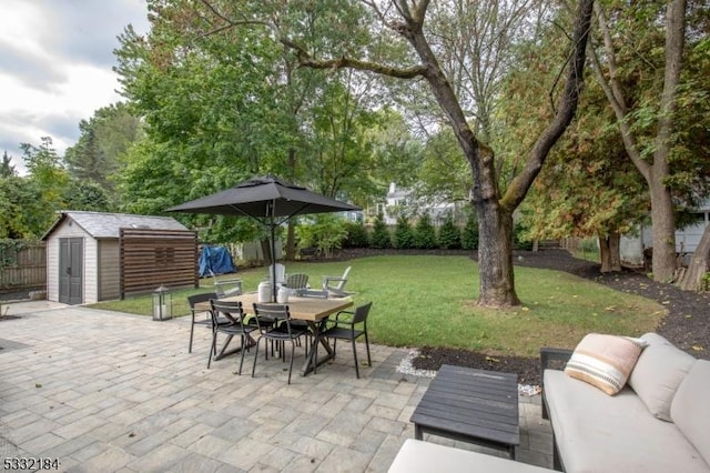 view of patio with a shed and an outdoor living space