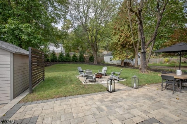 view of patio / terrace with a fire pit