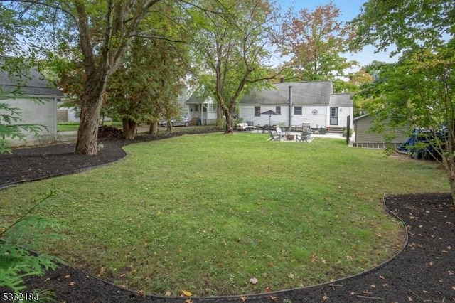 view of yard with a patio area