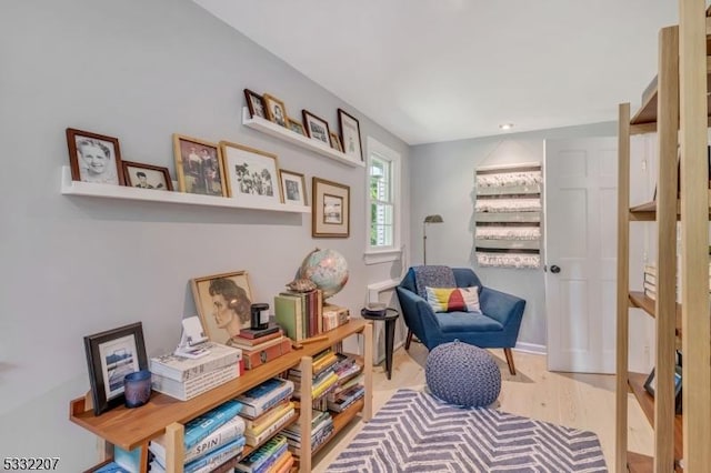 living area featuring hardwood / wood-style flooring