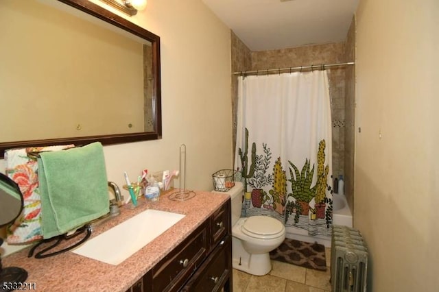 full bathroom with toilet, vanity, tile patterned flooring, radiator, and shower / bath combo with shower curtain