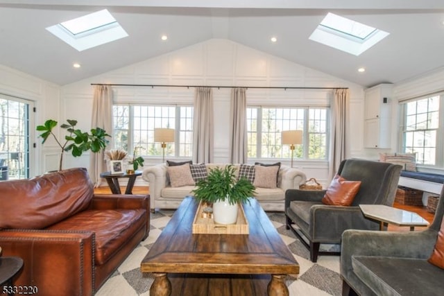 living room featuring lofted ceiling