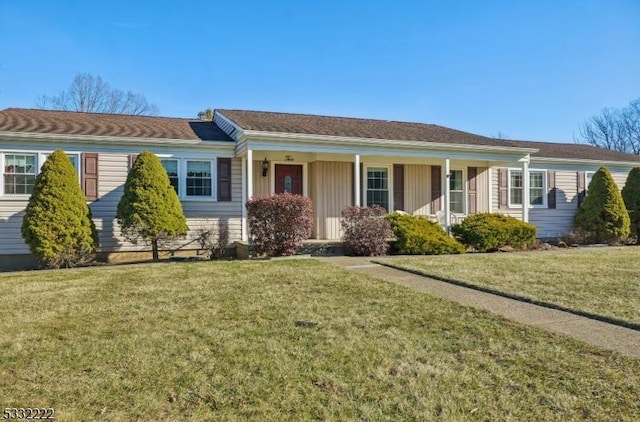 ranch-style house with a front lawn